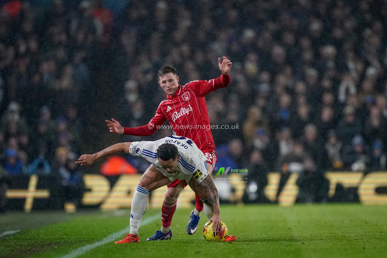 Elliot Anderson of Nottingham Forest is tackled by   Noah Okafor of Leeds United during the Premier League match Leeds United vs Nottingham Forest at Elland Road, Leeds, United Kingdom on 06 February 2026

(Photo by Maynard Manyowa/News Images)