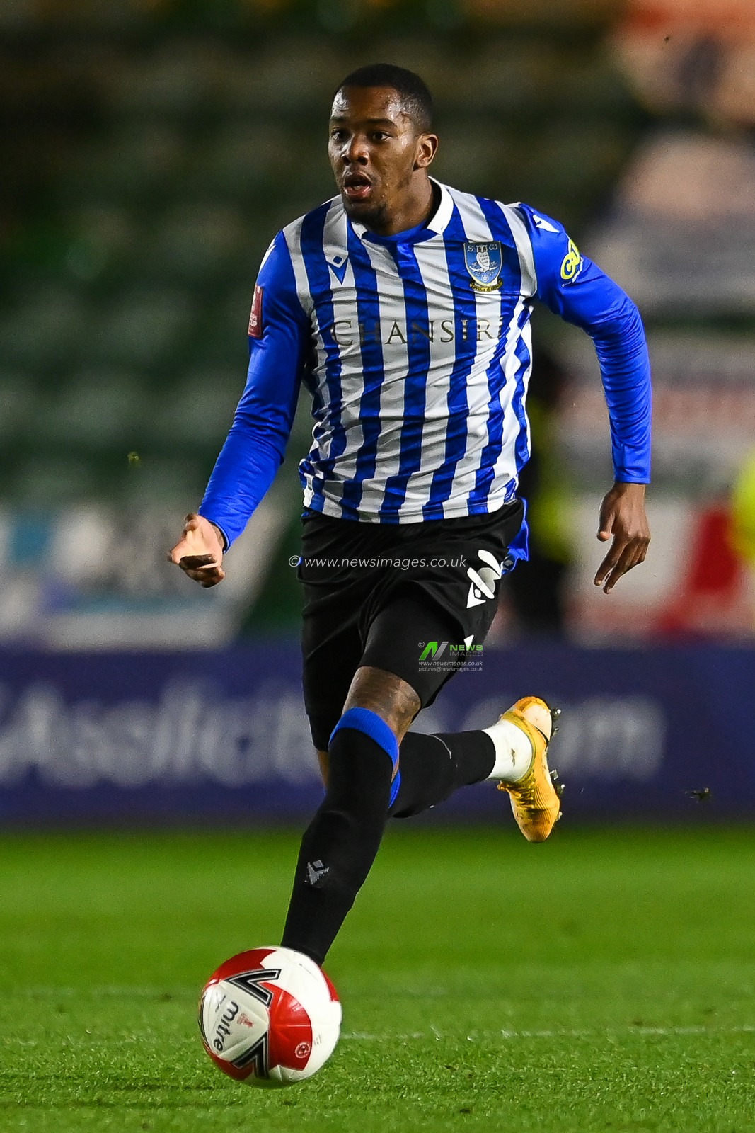 Jaden Brown #3 of Sheffield Wednesday makes a break with the ball