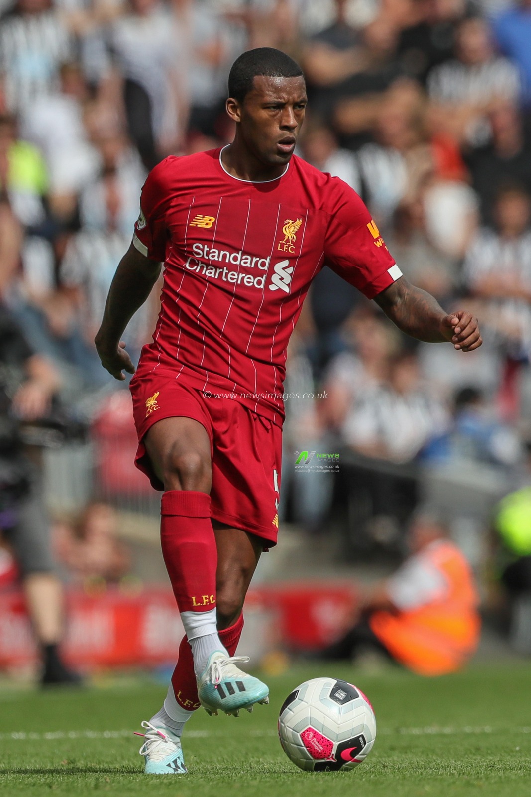 14th September 2019 , Anfield, Liverpool, England; Premier League Football, Liverpool vs Newcastle United ; Georginio Wijnaldum (5) of Liverpool in action during the game 


Credit: Mark Cosgrove/News Images 


Premier League/EFL Football images are subject to DataCo Licence