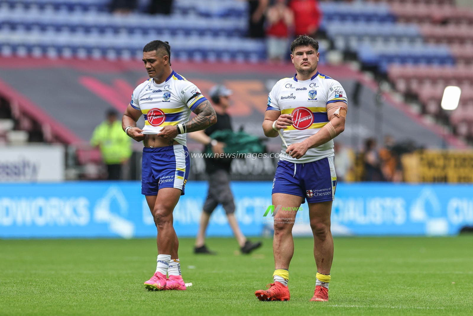 Pete Mataâ€™utia #3 of Warrington Wolves and Joe Philbin #15 of Warrington Wolves after the final hooter during the Betfred Challenge Cup Quarter-Final match Wigan Warriors vs Warrington Wolves at DW Stadium, Wigan, United Kingdom, 18th June 2023

(Photo by Mark Cosgrove/News Images)