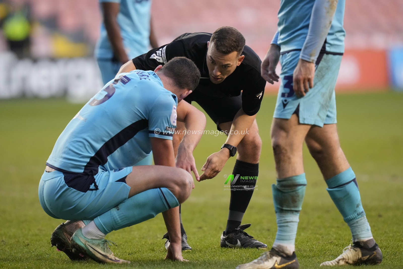 Referee Paul Howard checks on Elliott Moore of Oxford United during the Sky Bet League 1 match Blackpool vs Oxford United at Bloomfield Road, Blackpool, United Kingdom, 10th February 2024

(Photo by Steve Flynn/News Images)