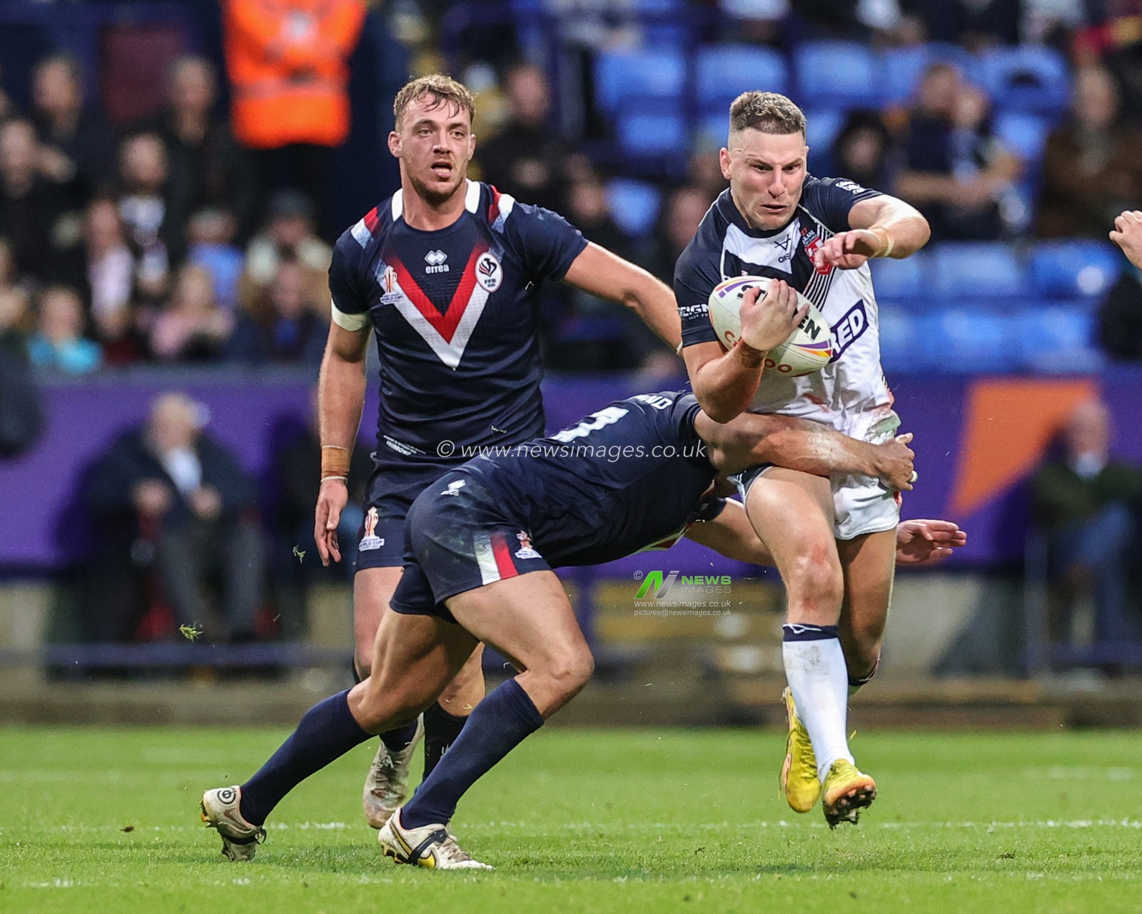 George Williams of England is tackled by MickaÃ«l Goudemand of France during the Rugby League World Cup 2021 Group A match England vs France at University of Bolton Stadium, Bolton, United Kingdom, 22nd October 2022

(Photo by Mark Cosgrove/News Images)