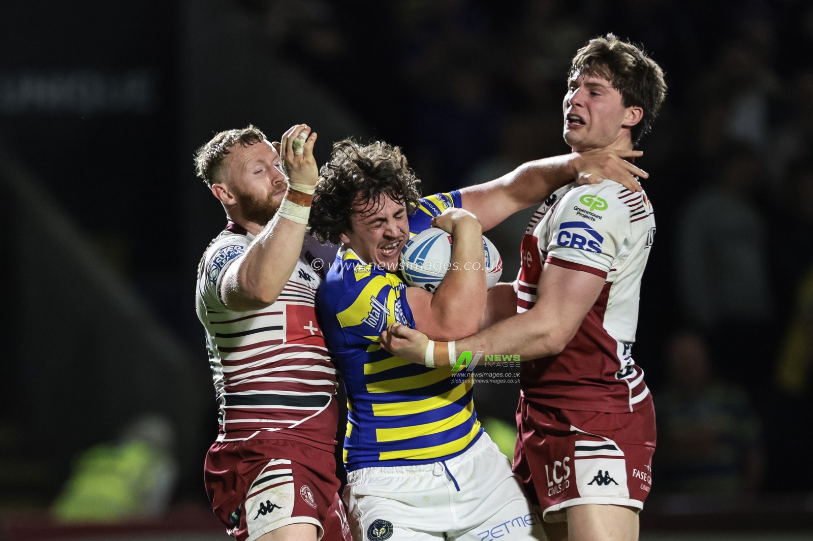 Max Wood of Warrington Wolves is tackled by Luke Thompson of Wigan Warriors during the Betfred Super League round 9 match Warrington Wolves vs Wigan Warriors at The Halliwell Jones Stadium, Warrington, United Kingdom on 24 April 2026

(Photo by Mark Cosgrove/News Images)