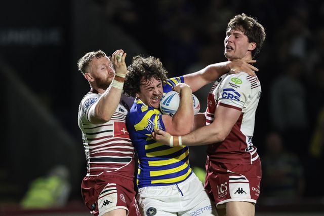 Max Wood of Warrington Wolves is tackled by Luke Thompson of Wigan Warriors during the Betfred Super League round 9 match Warrington Wolves vs Wigan Warriors at The Halliwell Jones Stadium, Warrington, United Kingdom on 24 April 2026

(Photo by Mark Cosgrove/News Images)