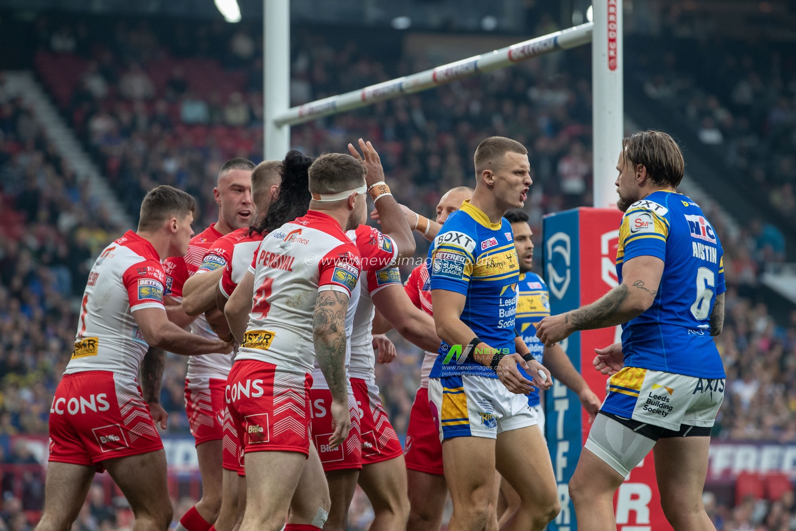 Matty Lees #10 of St Helens celebrates his try with his team mates and makes the score 4-0 during the 25th Betfred Super League Grand Final match St Helens vs Leeds Rhinos at Old Trafford, Manchester, United Kingdom, 23rd September 2022

(Photo by James Heaton/News Images)