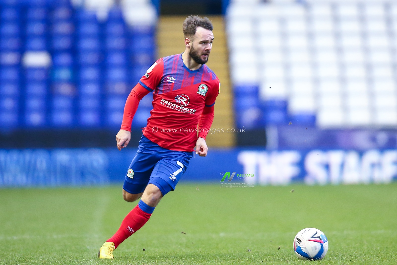 Adam Armstrong #7 of Blackburn Rovers dribbles the ball