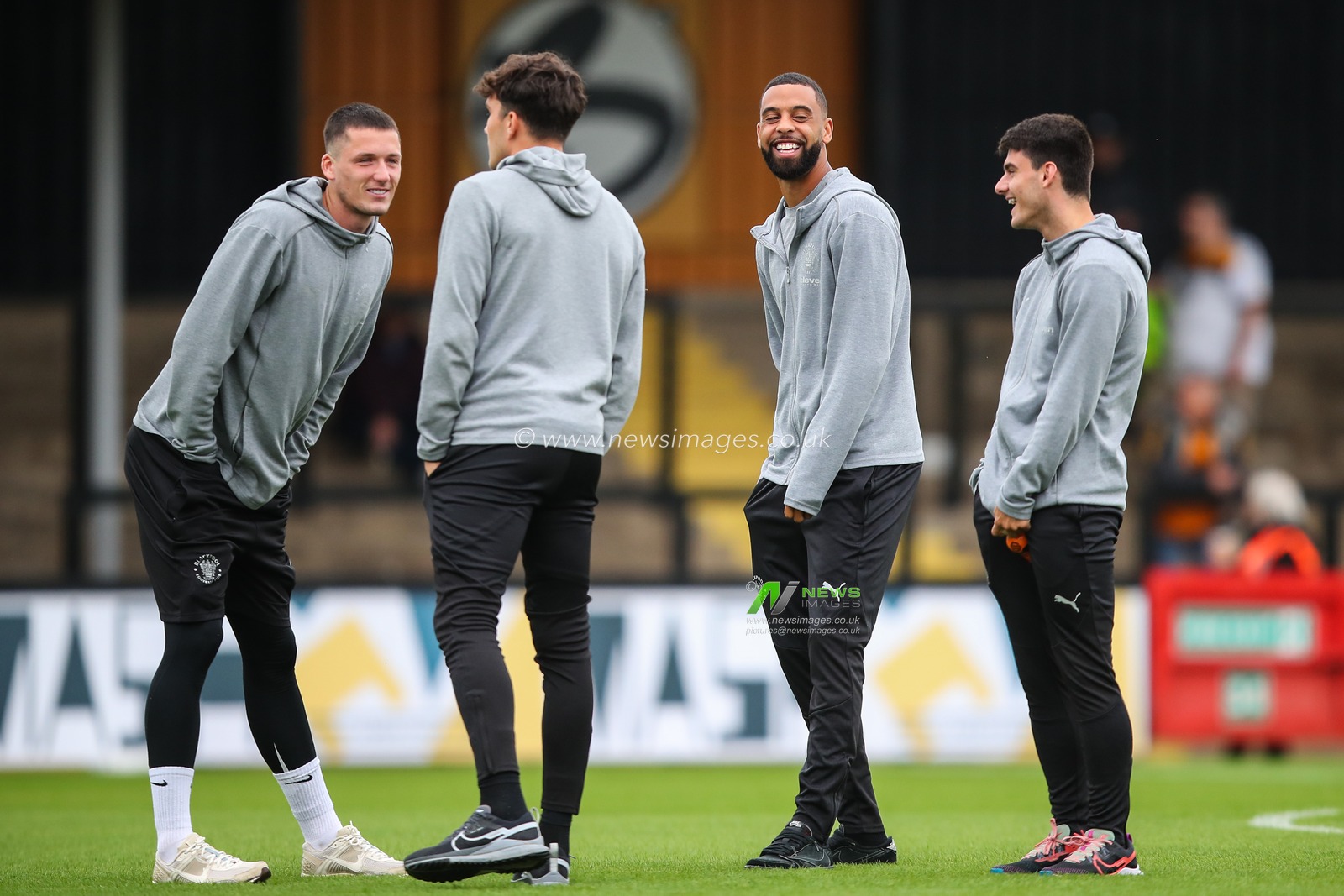 CJ Hamilton of Blackpool and teammates arrive ahead of the Sky Bet League 1 match Cambridge United vs Blackpool at Abbey Stadium, Cambridge, United Kingdom, 24th August 2024

(Photo by Gareth Evans/News Images)