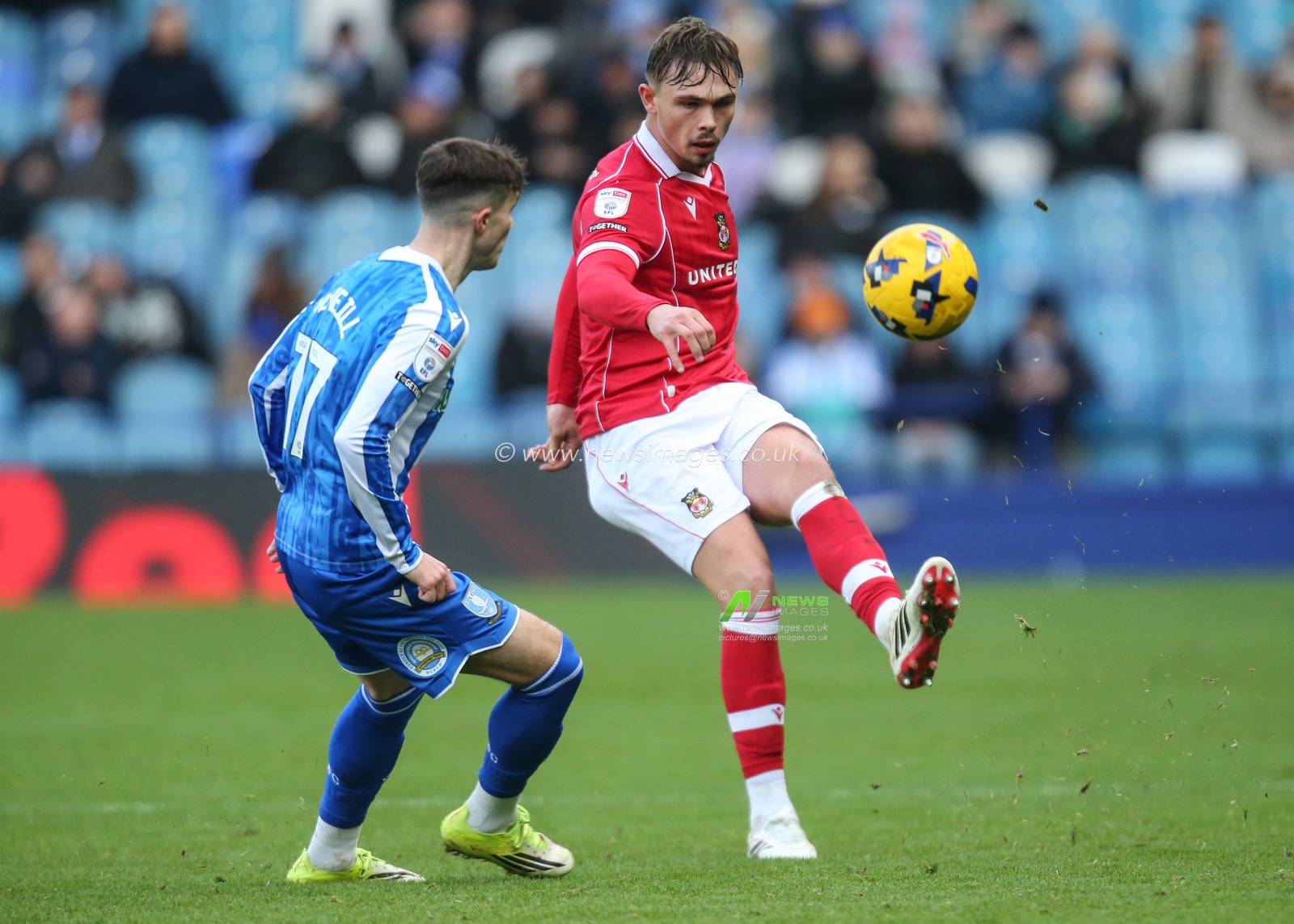 Callum Doyle of Wrexham passes the ball during the Sky Bet Championship match Sheffield Wednesday vs Wrexham at Hillsborough, Sheffield, United Kingdom, 31st January 2026

(Photo by Richard Bierton/News Images)