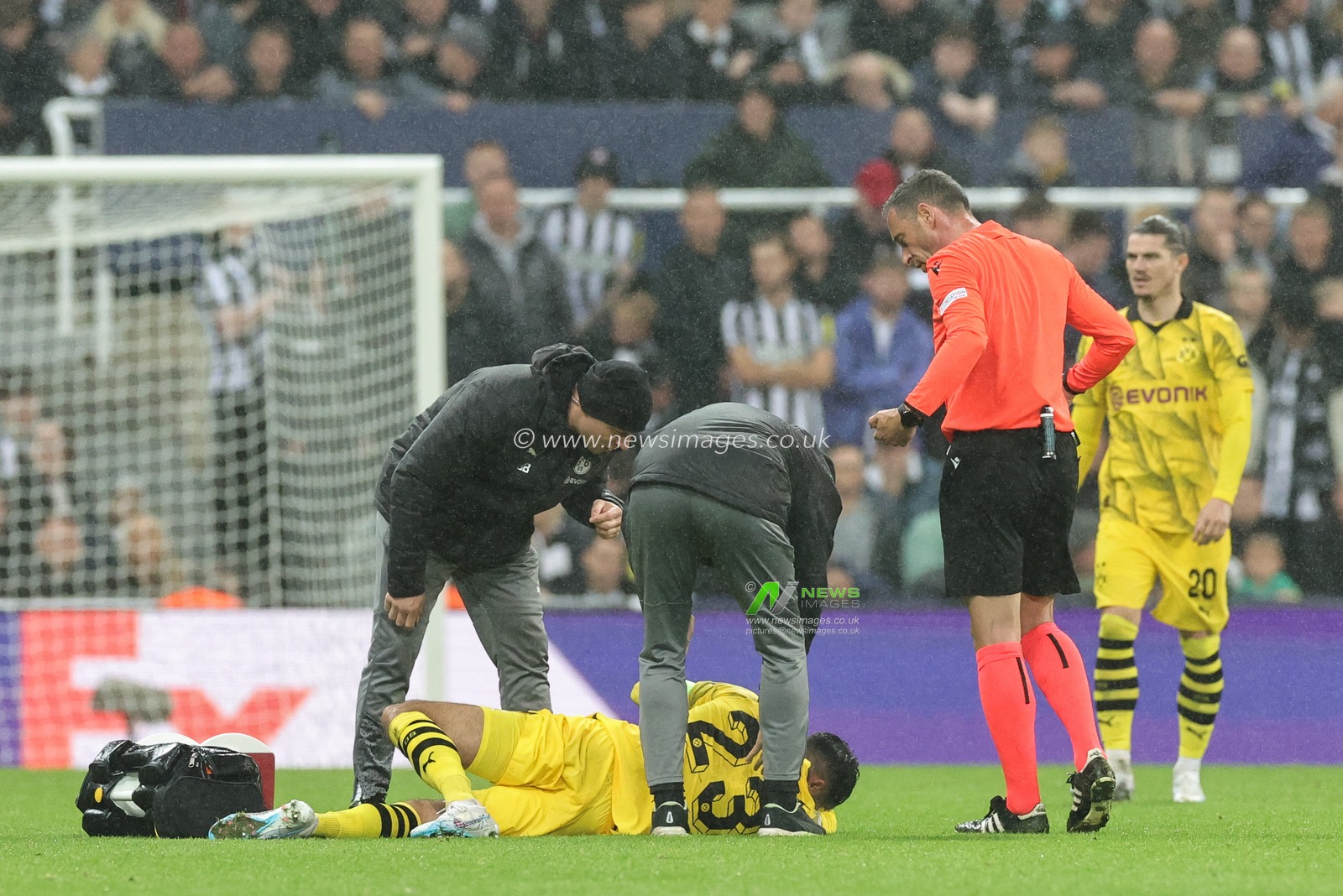 Emre Can #23 of Borussia Dortmund receives treatment during the UEFA Champions League match Newcastle United vs Borussia Dortmund at St. James's Park, Newcastle, United Kingdom, 25th October 2023

(Photo by Mark Cosgrove/News Images)