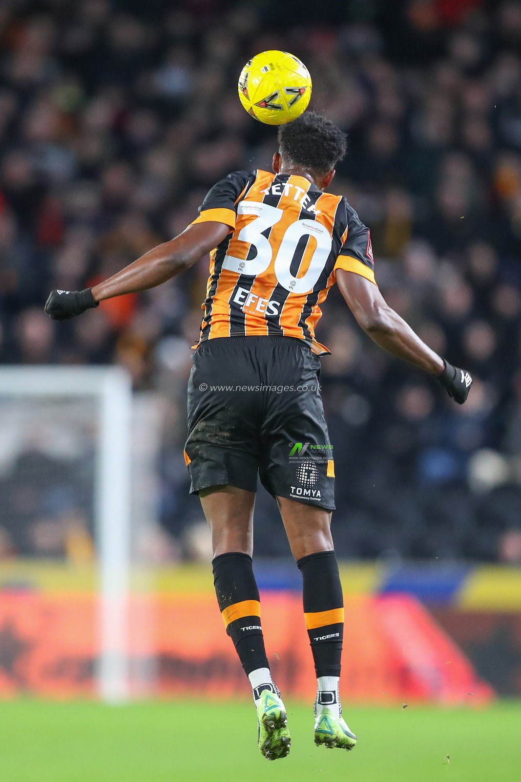 Benjamin Tetteh #30 of Hull City heads the ball during the Emirates FA Cup Third Round match Hull City vs Fulham at MKM Stadium, Hull, United Kingdom, 7th January 2023

(Photo by Gareth Evans/News Images)