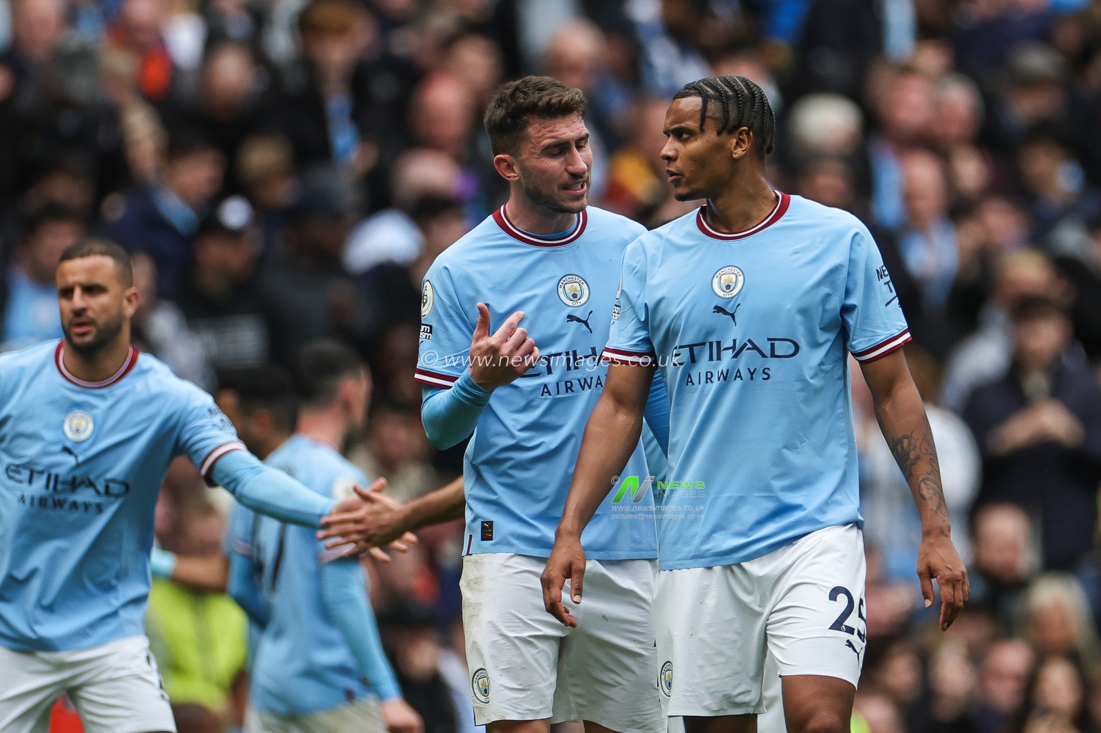 Aymeric Laporte #14 of Manchester City speaks to Manuel Akanji #25 of Manchester City during the Premier League match Manchester City vs Leeds United at Etihad Stadium, Manchester, United Kingdom, 6th May 2023

(Photo by Mark Cosgrove/News Images)