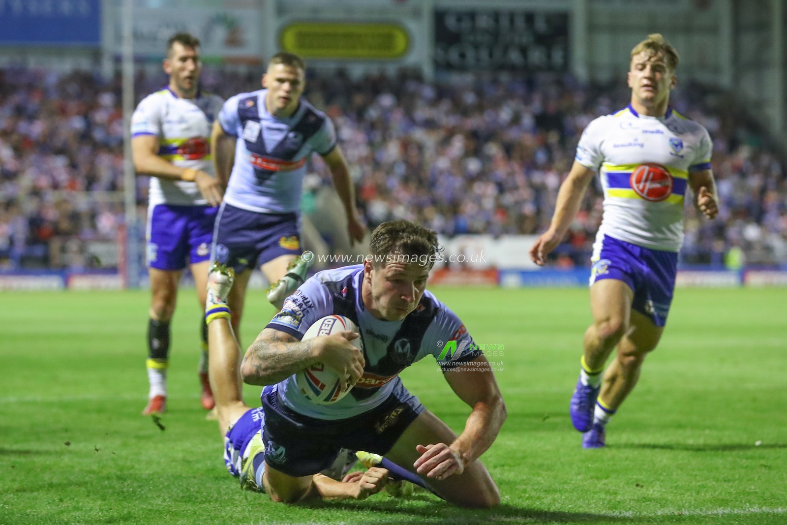 Mark Percival #4 of St Helens goes over for a try and makes the score 0-4 during the Betfred Super League Round 26 match Warrington Wolves vs St Helens at Halliwell Jones Stadium, Warrington, United Kingdom, 15th September 2023

(Photo by Gareth Evans/News Images)
