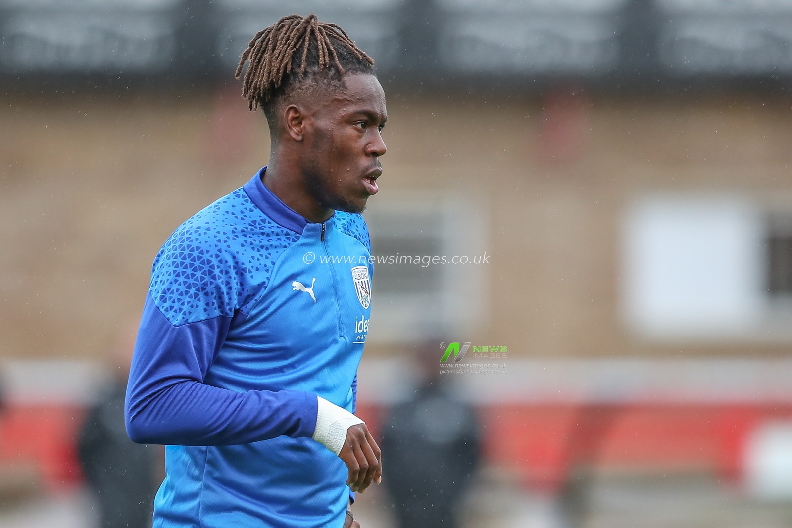 Brandon Thomas-Asante #21 of West Bromwich Albion during the pre-game warm up ahead of the Pre-season friendly match Cheltenham Town vs West Bromwich Albion at The Completely-Suzuki Stadium, Cheltenham, United Kingdom, 18th July 2023

(Photo by Gareth Evans/News Images)