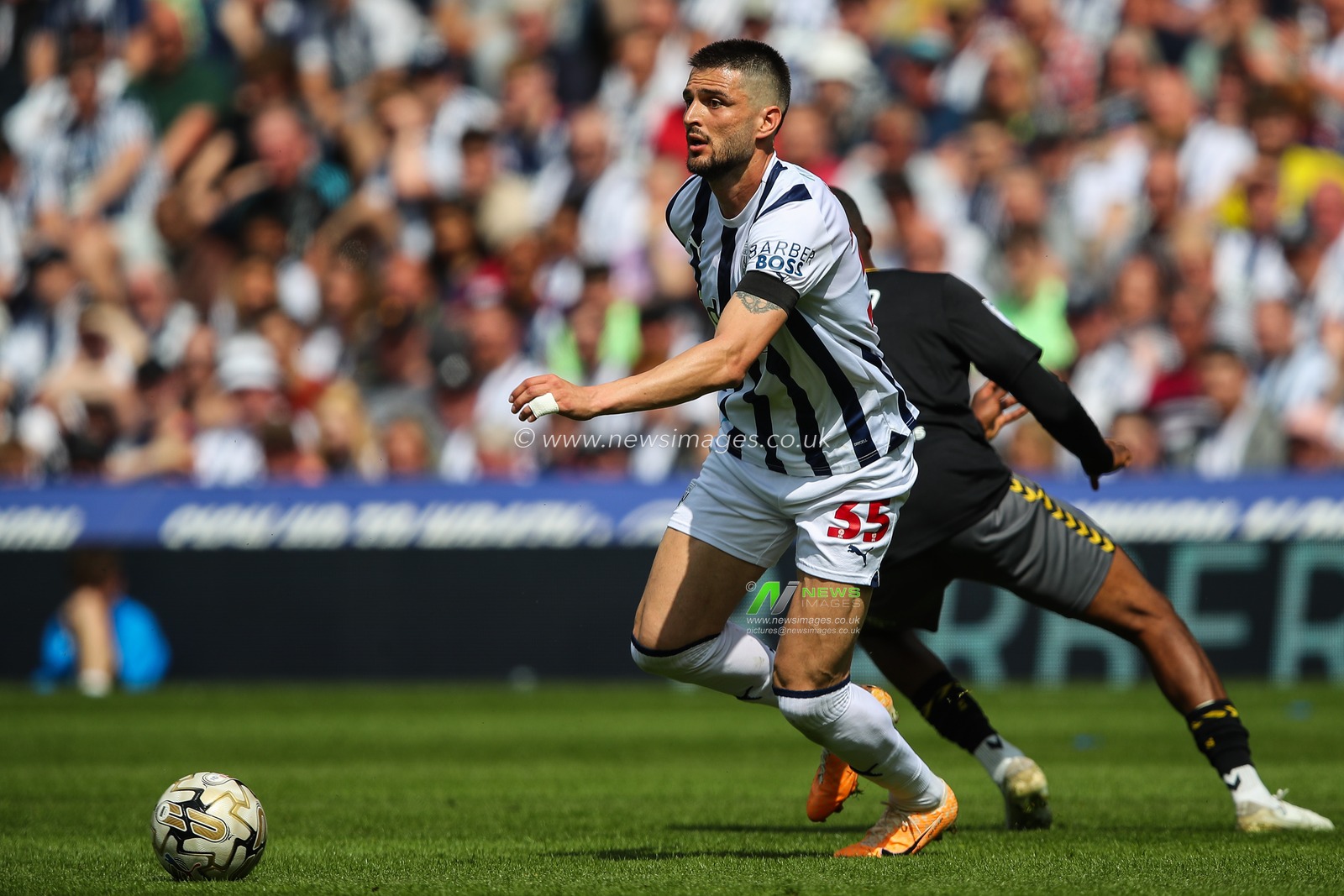 Okay YokuÅŸlu of West Bromwich Albion gets past Joe Aribo of Southampton during the Sky Bet Championship Play-Off Semi-Final First Leg match West Bromwich Albion vs Southampton at The Hawthorns, West Bromwich, United Kingdom, 12th May 2024

(Photo by Gareth Evans/News Images)