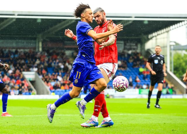 Maghnes Akliouche of Monaco is tackled by Morato of Nottingham Forest during the Pre-season friendly match Nottingham Forest vs Monaco at SMH Group Stadiumact Stadium, Chesterfield, United Kingdom, 19th July 2025

(Photo by Richard Bierton/News Images)