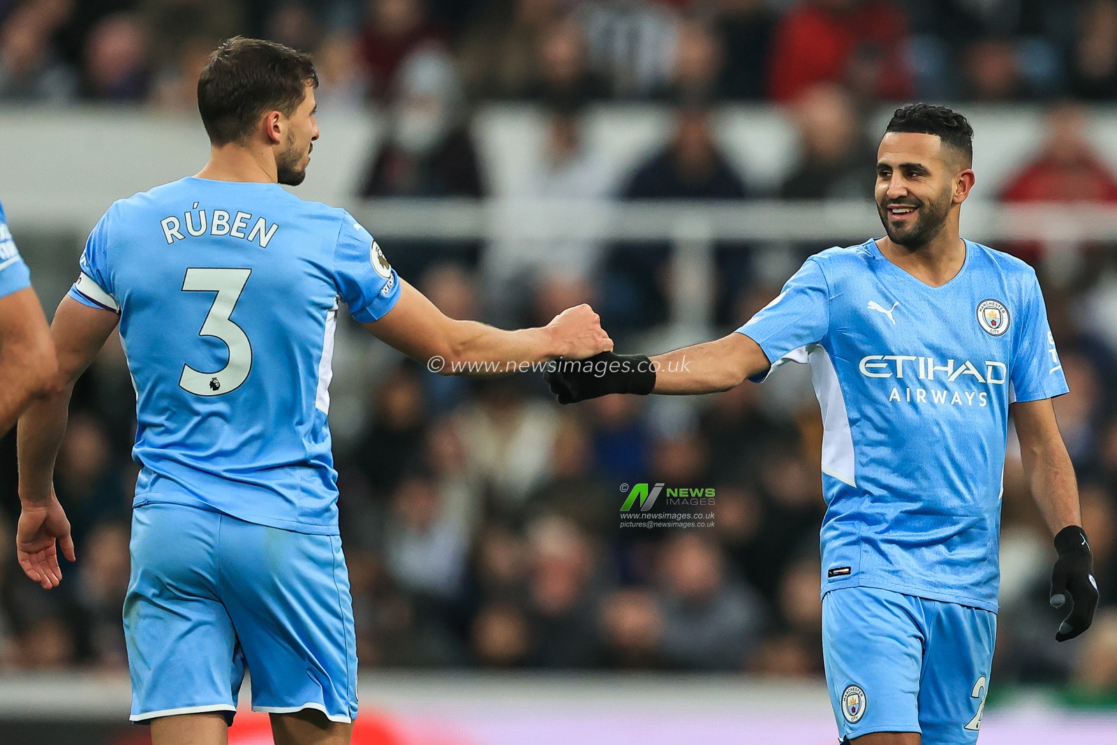 Riyad Mahrez #26 of Manchester City celebrates his goal to make it 0-3