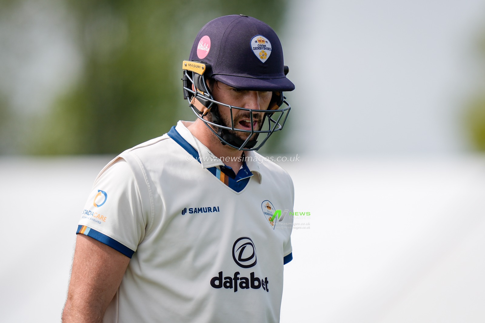 Ben Aitchison walks off after being caught by Cameron Bancroft off the bowling of Craig Miles as Gloucestershire players celebrate a wicket during the County Championship Division Two Derbyshire v Gloucestershire at The Central Co-Op County Ground, Derby, United Kingdom on 26 April 2026

(Photo by Maynard Manyowa/News Images)