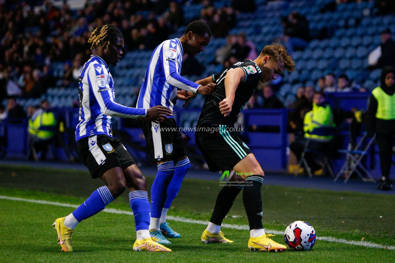 Jaden Brown #3 of Sheffield Wednesday and Alex Mighten #45 of Sheffield Wednesday challenge Will Alves #57 of Leicester City during the Papa John's Trophy match Sheffield Wednesday vs Leicester City U21 at Hillsborough, Sheffield, United Kingdom, 18th October 2022

(Photo by Ben Early/News Images)