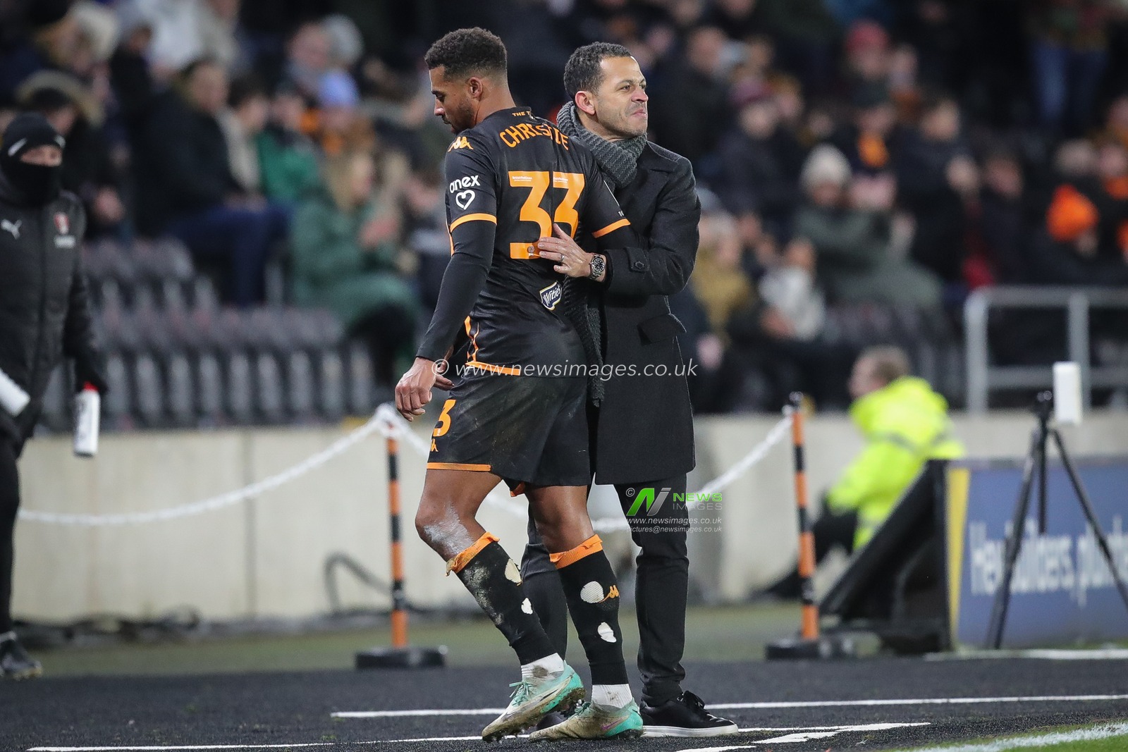 Liam Rosenior manager of Hull City hugs Cyrus Christie #33 of Hull City as he comes off in the second half of the Sky Bet Championship match Hull City vs Rotherham United at MKM Stadium, Hull, United Kingdom, 28th November 2023

(Photo by James Heaton/News Images)