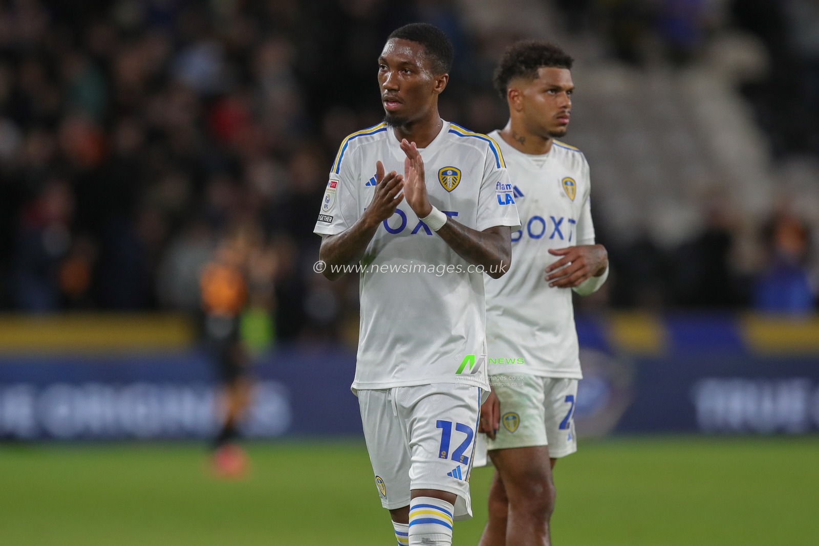 Jaidon Anthony #12 of Leeds United claps his hands and applauds the supporters at full-time after the Sky Bet Championship match Hull City vs Leeds United at MKM Stadium, Hull, United Kingdom, 20th September 2023

(Photo by James Heaton/News Images)