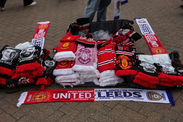 Manchester United and Leeds United scarfs on sale during the Premier League match Manchester United vs Leeds United at Old Trafford, Manchester, United Kingdom on 13 April 2026

(Photo by Mark Cosgrove/News Images)