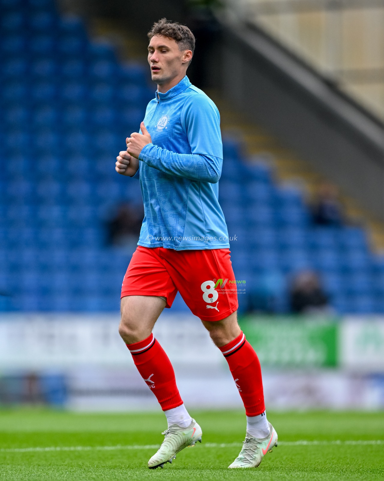 Matty Virtue of Fleetwood Town  warms up during the Sky Bet League 2 match Chesterfield vs Fleetwood Town at SMH Group Stadium, Chesterfield, United Kingdom, 18th October 2025

(Photo by Adam Gee/News Images)