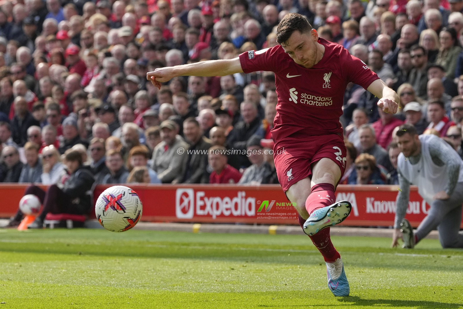 Andrew Robertson #26 of Liverpool crosses the ball during the Premier League match Liverpool vs Nottingham Forest at Anfield, Liverpool, United Kingdom, 22nd April 2023

(Photo by Steve Flynn/News Images)