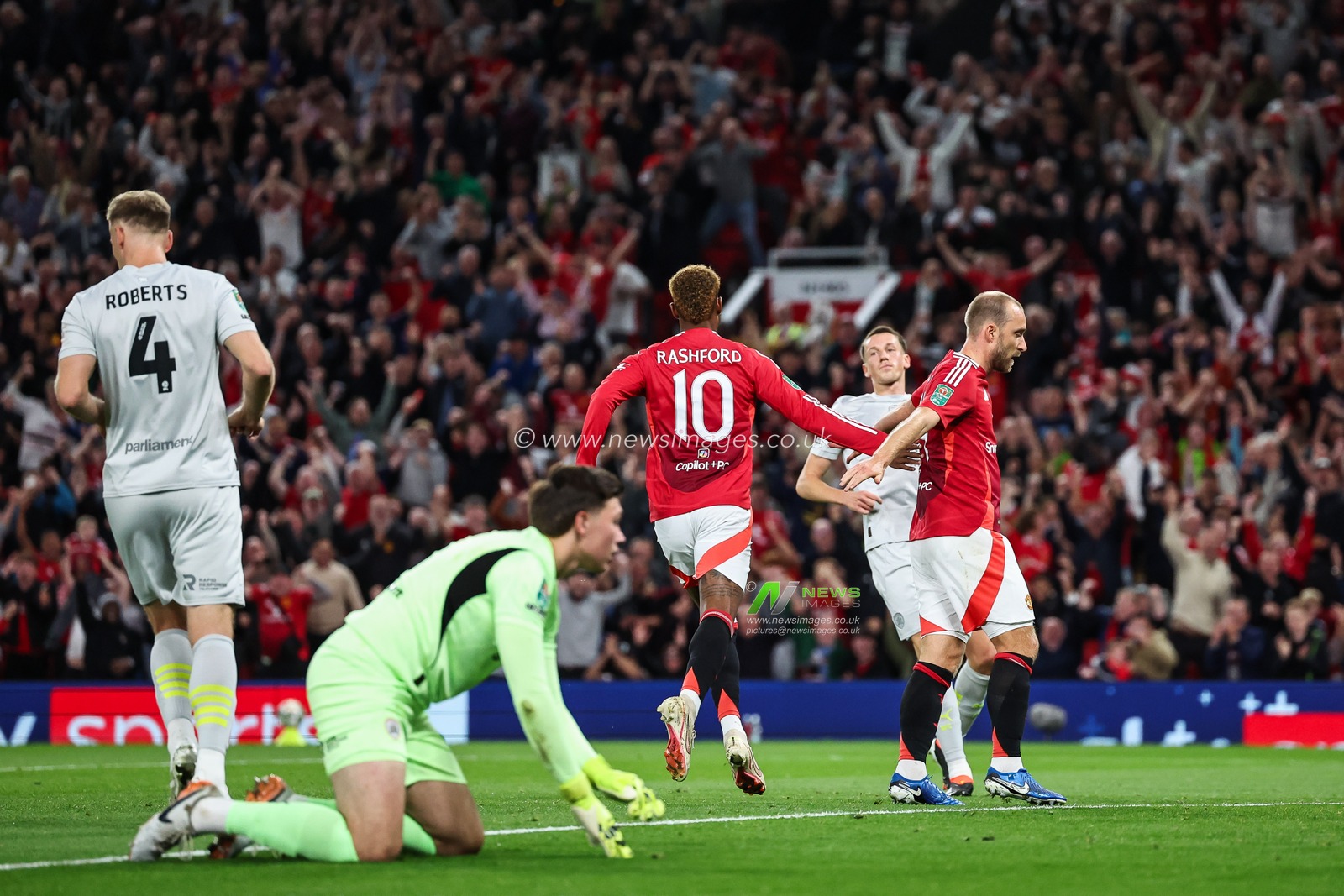 Marcus Rashford of Manchester United celebrates his goal to make it 1-0 during the Carabao Cup 3rd Round match Manchester United vs Barnsley at Old Trafford, Manchester, United Kingdom, 17th September 2024

(Photo by Mark Cosgrove/News Images)