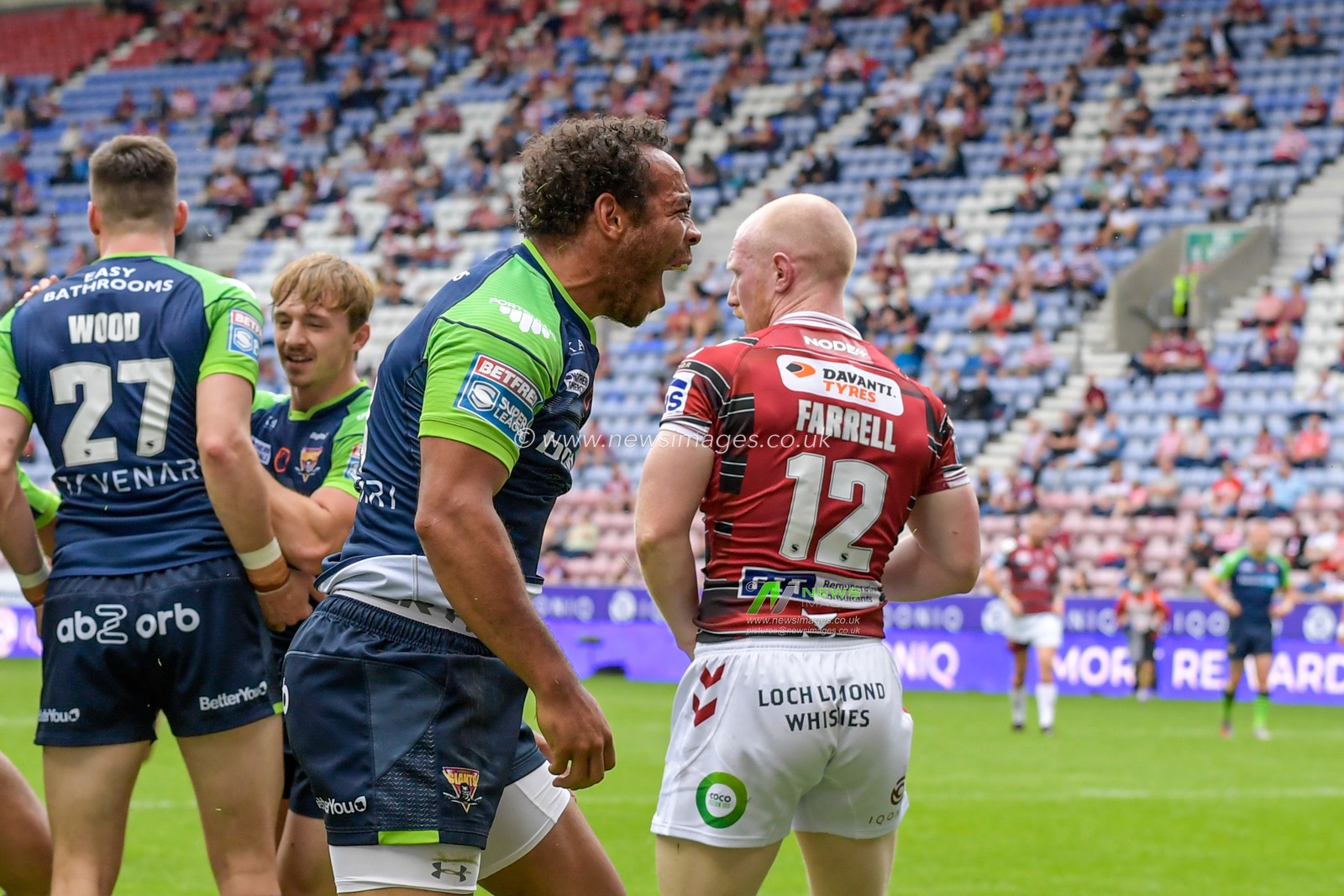 Leroy Cudjoe (21) of Huddersfield Giants celebrates scoring a try to make it 0-10