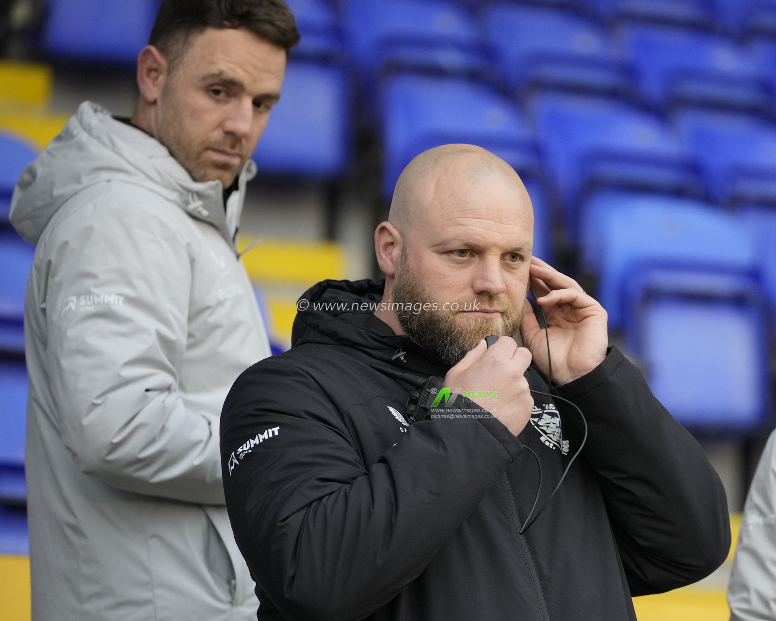 Simon Grix, head coach of Hull FC tests his communications before the Betfred Super League Round 10 match Warrington Wolves vs Hull FC at Halliwell Jones Stadium, Warrington, United Kingdom, 3rd May 2024

(Photo by Steve Flynn/News Images)