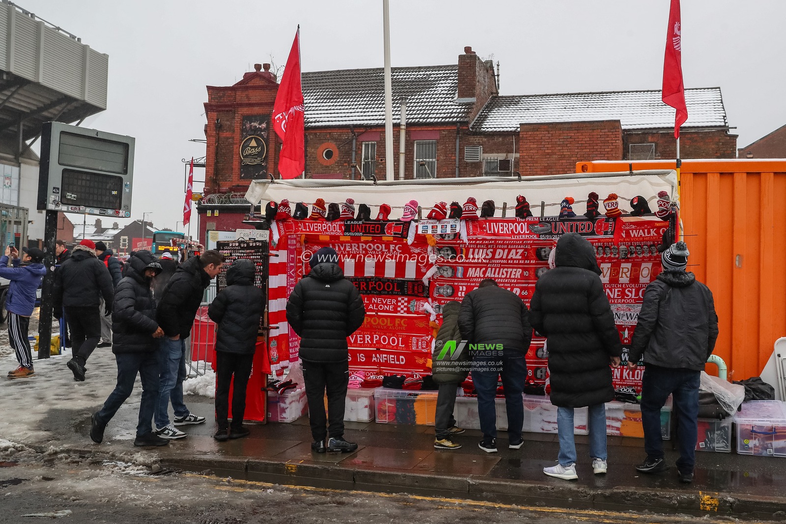 Fans purchase Liverpool memorabilia during the Premier League match Liverpool vs Manchester United at Anfield, Liverpool, United Kingdom, 5th January 2025

(Photo by Gareth Evans/News Images)