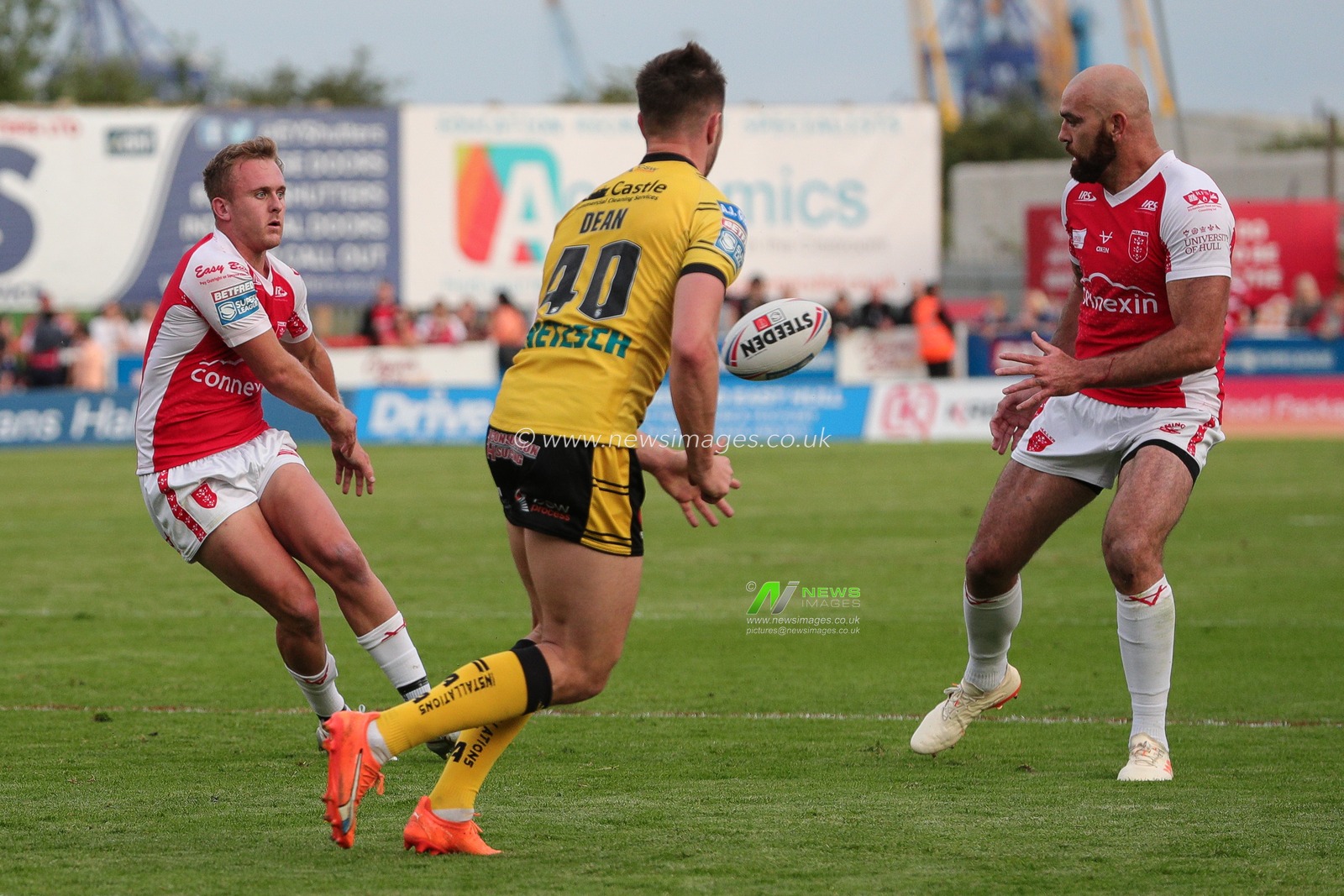 Jez Litten #14 of Hull KR passes the ball to Sam Luckley #26 of Hull KR during the Betfred Super League Round 20 match Hull KR vs Castleford Tigers at Sewell Group Craven Park, Kingston upon Hull, United Kingdom, 28th July 2023

(Photo by James Heaton/News Images)