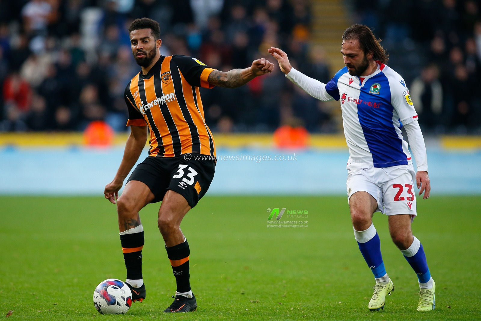 Cyrus Christie #33 of Hull City and Bradley Dack #23 of Blackburn Rovers  during the Sky Bet Championship match Hull City vs Blackburn Rovers at MKM Stadium, Hull, United Kingdom, 29th October 2022

(Photo by Ben Early/News Images)