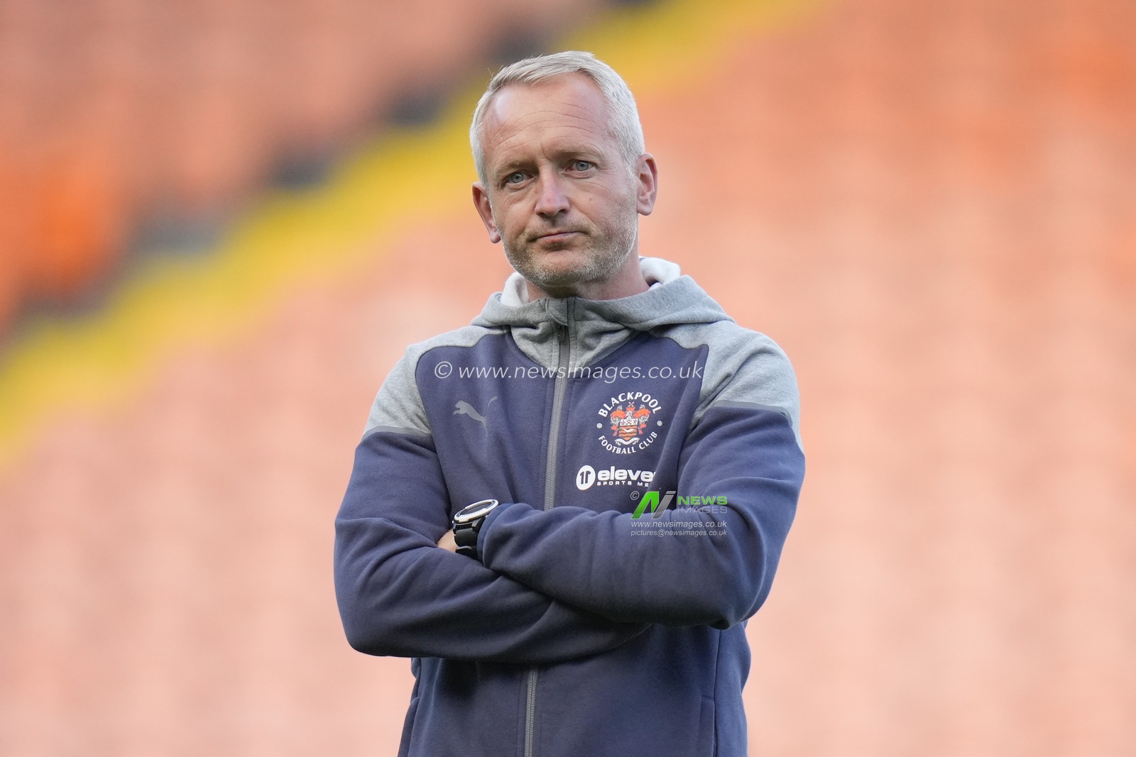 Neil Critchley Manager of Blackpool watches his players warm up before the Sky Bet League 1 match Blackpool vs Port Vale at Bloomfield Road, Blackpool, United Kingdom, 15th August 2023

(Photo by Steve Flynn/News Images)