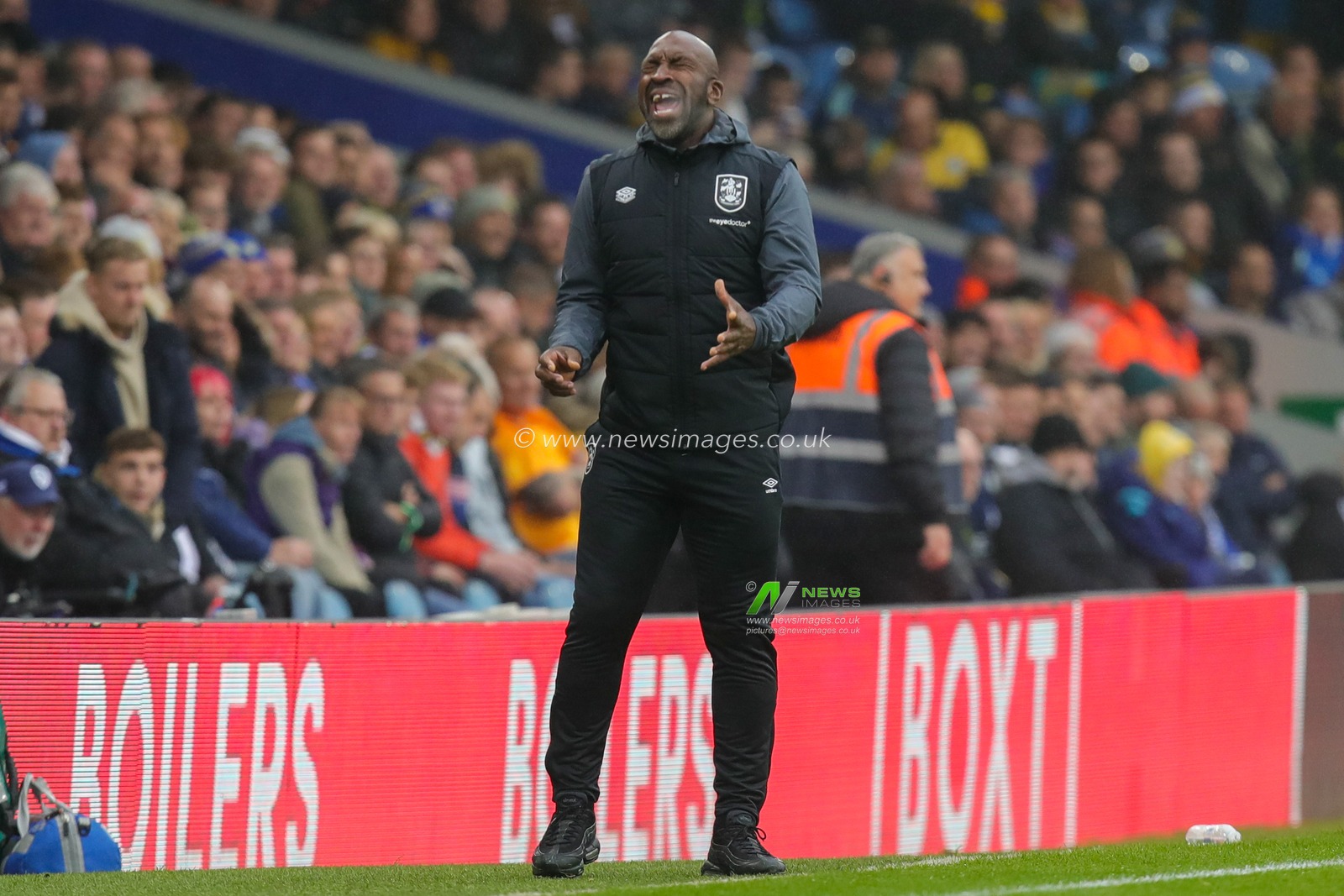 An angry and dejected Darren Moore manager of Huddersfield Town reacts as another goal goes in for Leeds during the Sky Bet Championship match Leeds United vs Huddersfield Town at Elland Road, Leeds, United Kingdom, 28th October 2023

(Photo by James Heaton/News Images)