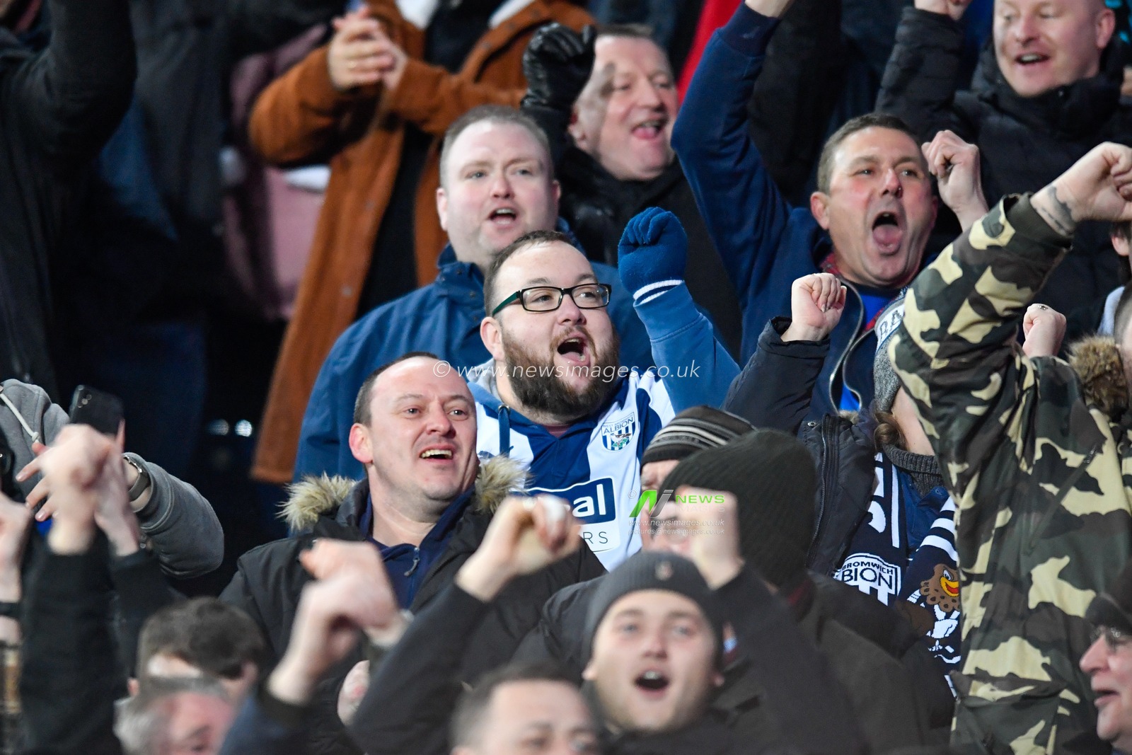 1st January 2020, The Hawthorns, West Bromwich, England; Sky Bet Championship, West Bromwich Albion v Leeds United : The West Bromwich Albion fans celebrate taking an early lead against Leeds United

Credit: Simon Whitehead/News Images