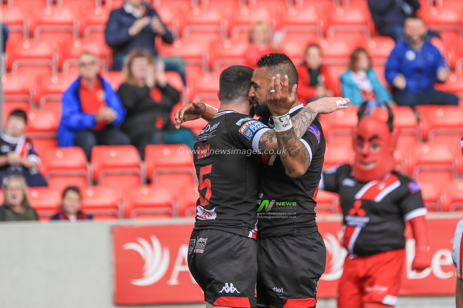16th June 2019 ,  AJ Bell Stadium, Salford, England;  Betfred Super League, Round 18, Salford Red Devils vs Wakefield Trintiny ; Jake Bibby (5) of Salford Red Devils celebrates his try 

Credit: Mark Cosgrove/News Images