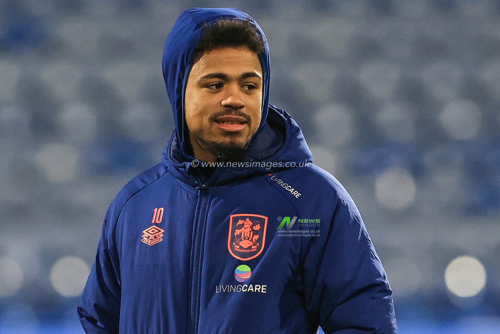 Josh Koroma #10 of Huddersfield Town during the pitch inspection