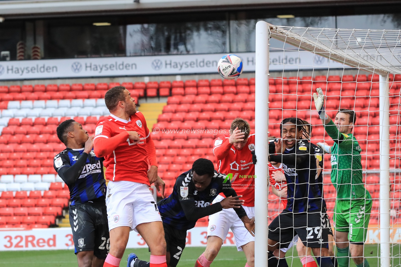 Alex Mowatt #27 of Barnsley scored direct from a corner to make it 1-0