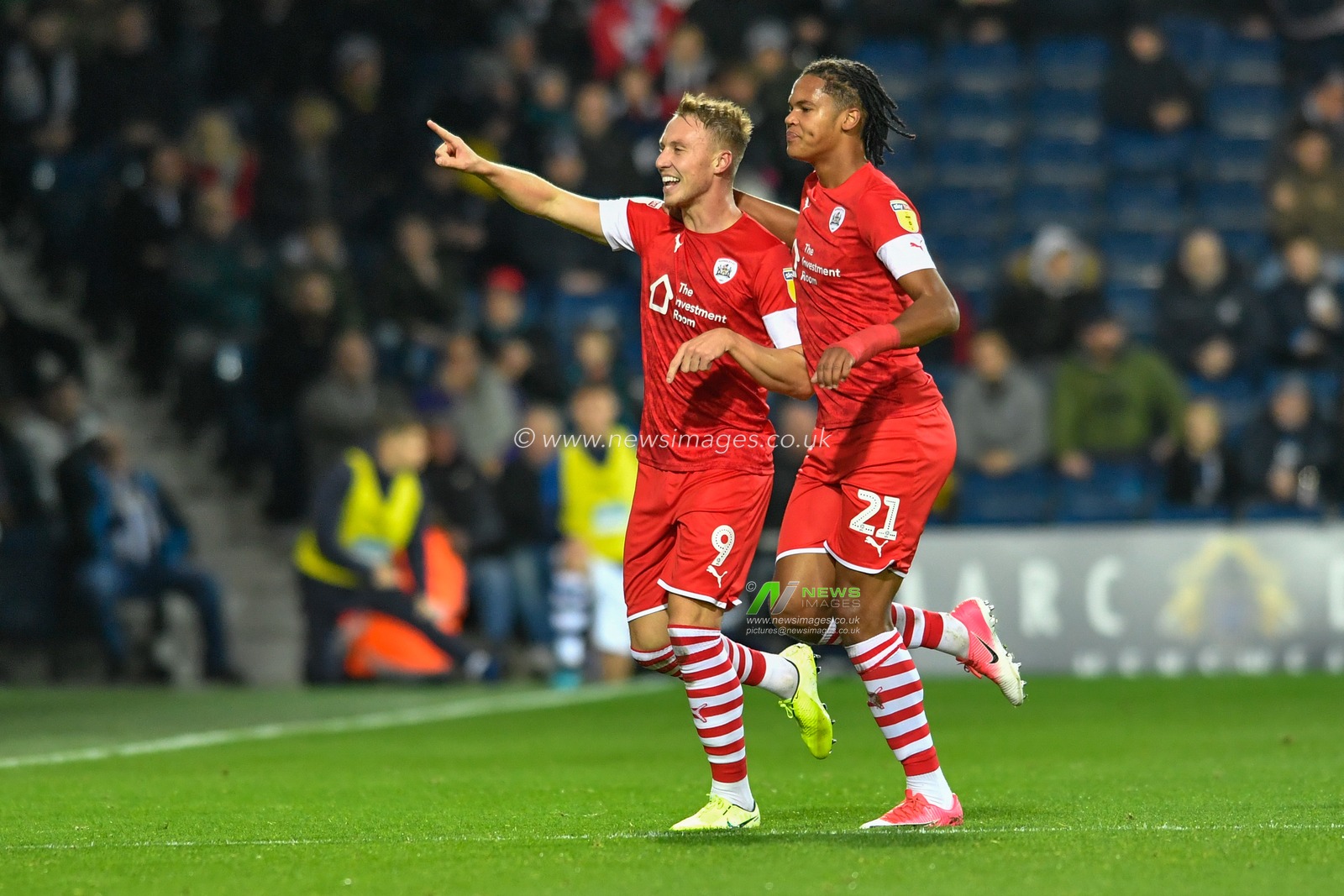 22nd October 2019, The Hawthorns, West Bromwich, England; Sky Bet Championship, West Bromwich Albion v Barnsley : Cauley Woodrow (9) of Barnsley celebrates scoring a goal with Toby Sibbick (21) 

Credit: Simon Whitehead/News Images