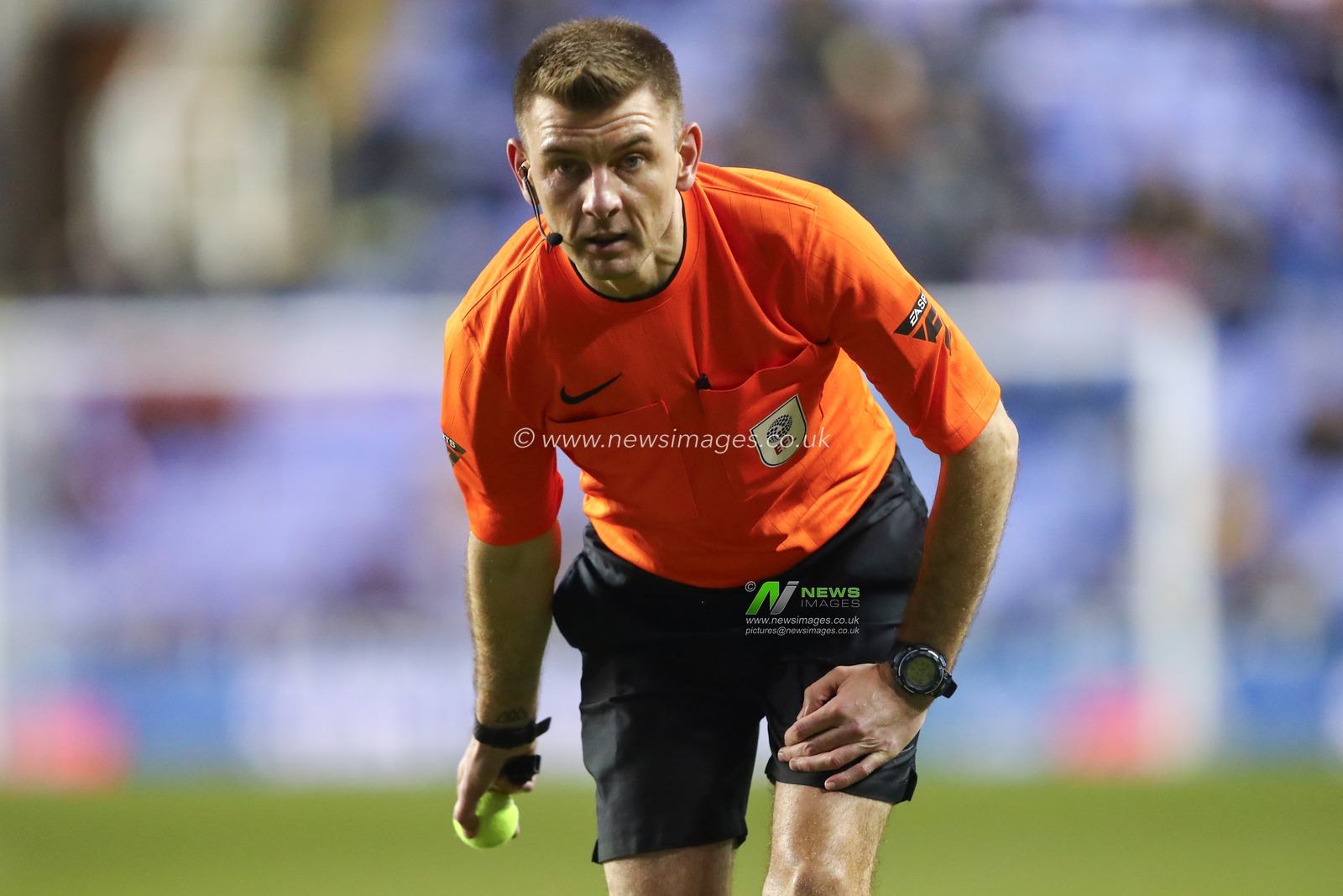 Referee Oliver Yates clears the pitch of tennis balls thrown on by Reading fans in protest of the clubs owner during the Sky Bet League 1 match Reading vs Barnsley at Select Car Leasing Stadium, Reading, United Kingdom, 9th December 2023

(Photo by Gareth Evans/News Images)