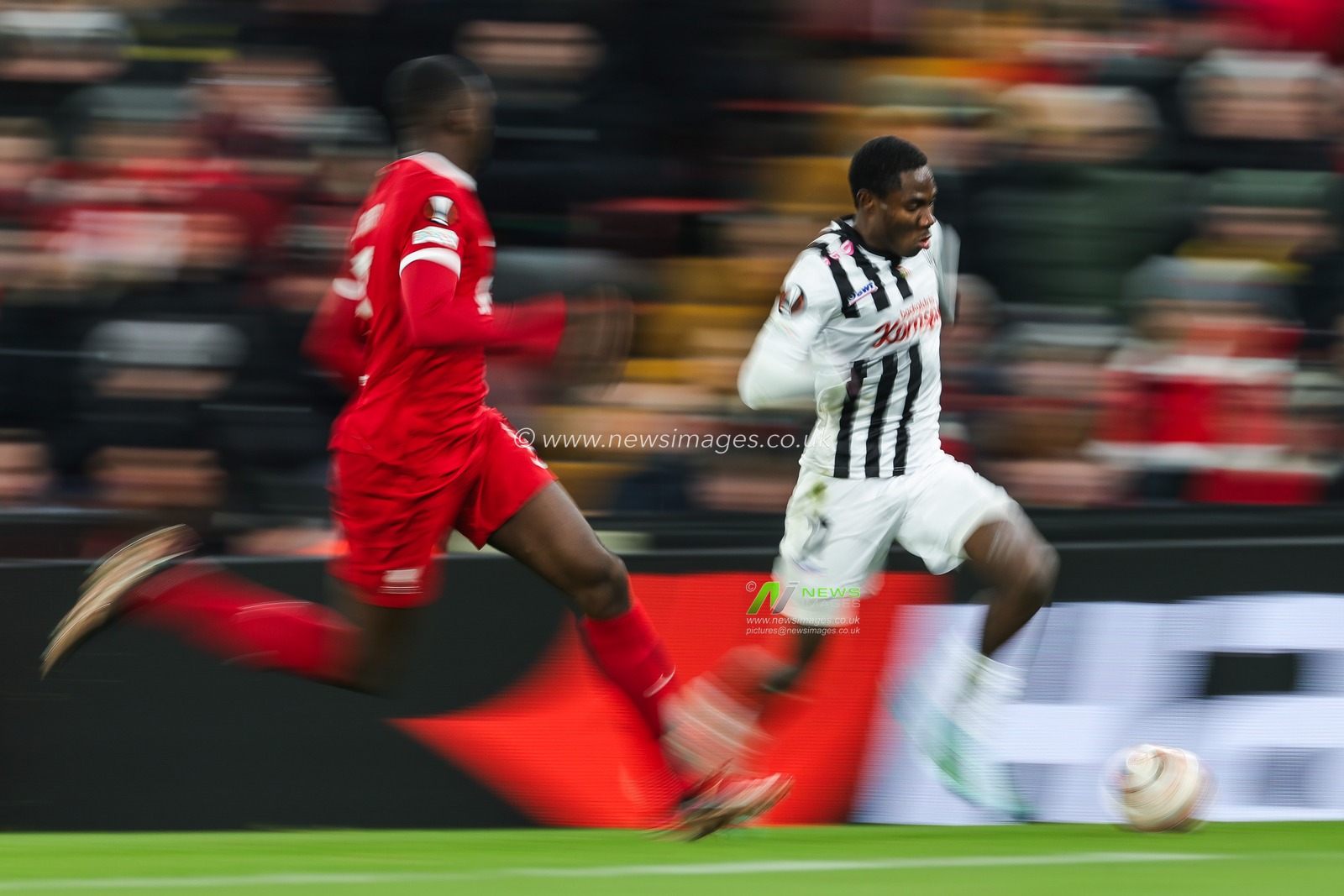 George Bello #2 of LASK makes a break with the ball during the UEFA Europa League Group E match Liverpool vs LASK at Anfield, Liverpool, United Kingdom, 30th November 2023

(Photo by Mark Cosgrove/News Images)
