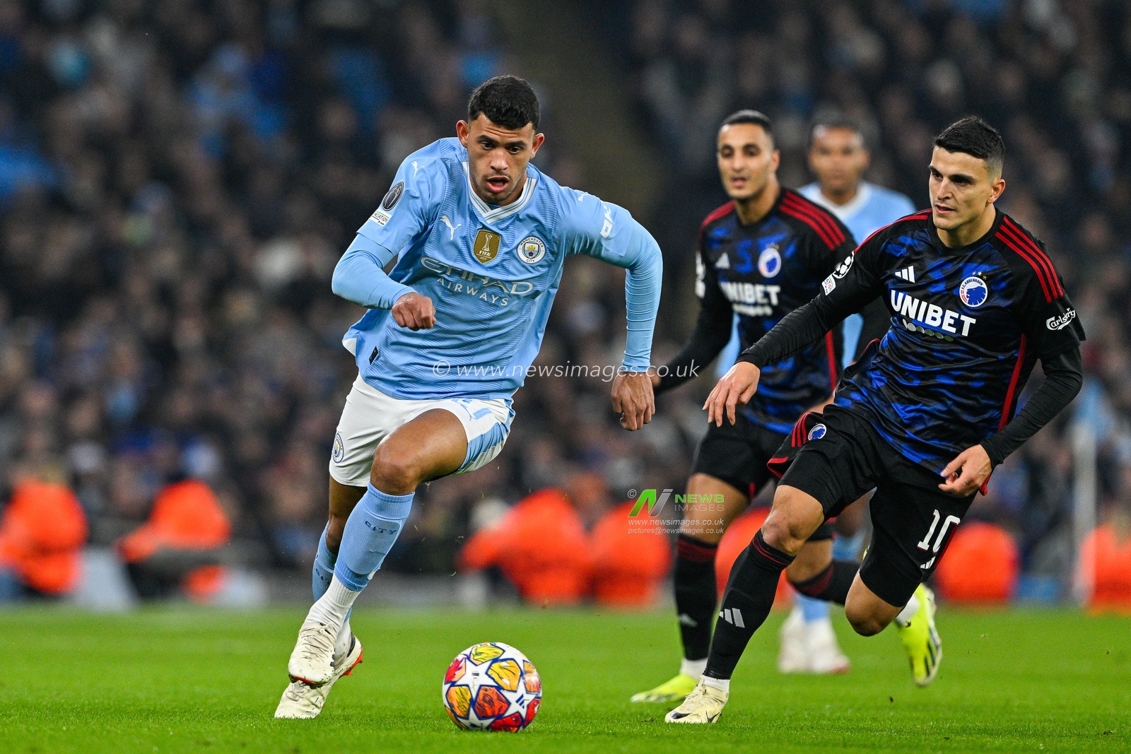 Matheus Nunes of Manchester City makes a break with the ball during the UEFA Champions League match Manchester City vs F.C. Copenhagen at Etihad Stadium, Manchester, United Kingdom, 6th March 2024

(Photo by Cody Froggatt/News Images)