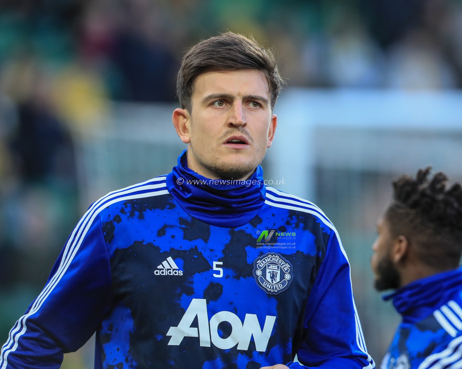 27th October 2019, Carrow Road, Norwich, England; Premier League, Norwich City v Manchester United : Harry Maguire (5) of Manchester United gaming up 

Credit: Mark Cosgrove/News Images