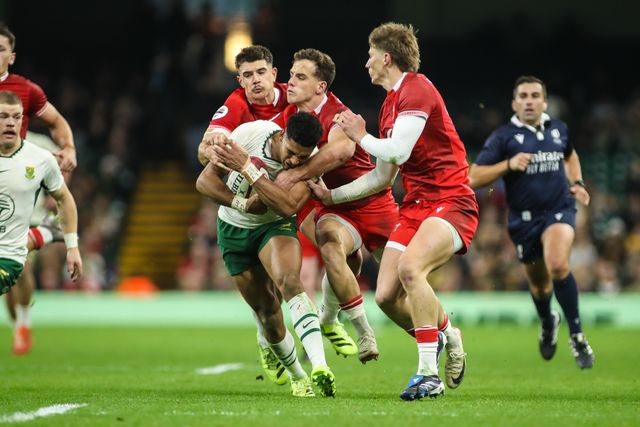 Sacha Feinberg-Mngomezulu of South Africa is tackled by the Welsh defence during the Quilter Nations Series 2025 match Wales vs South Africa at Principality Stadium, Cardiff, United Kingdom, 29th November 2025

(Photo by Andrew Lewis/News Images)

*** GER AUT SUI OUT ***