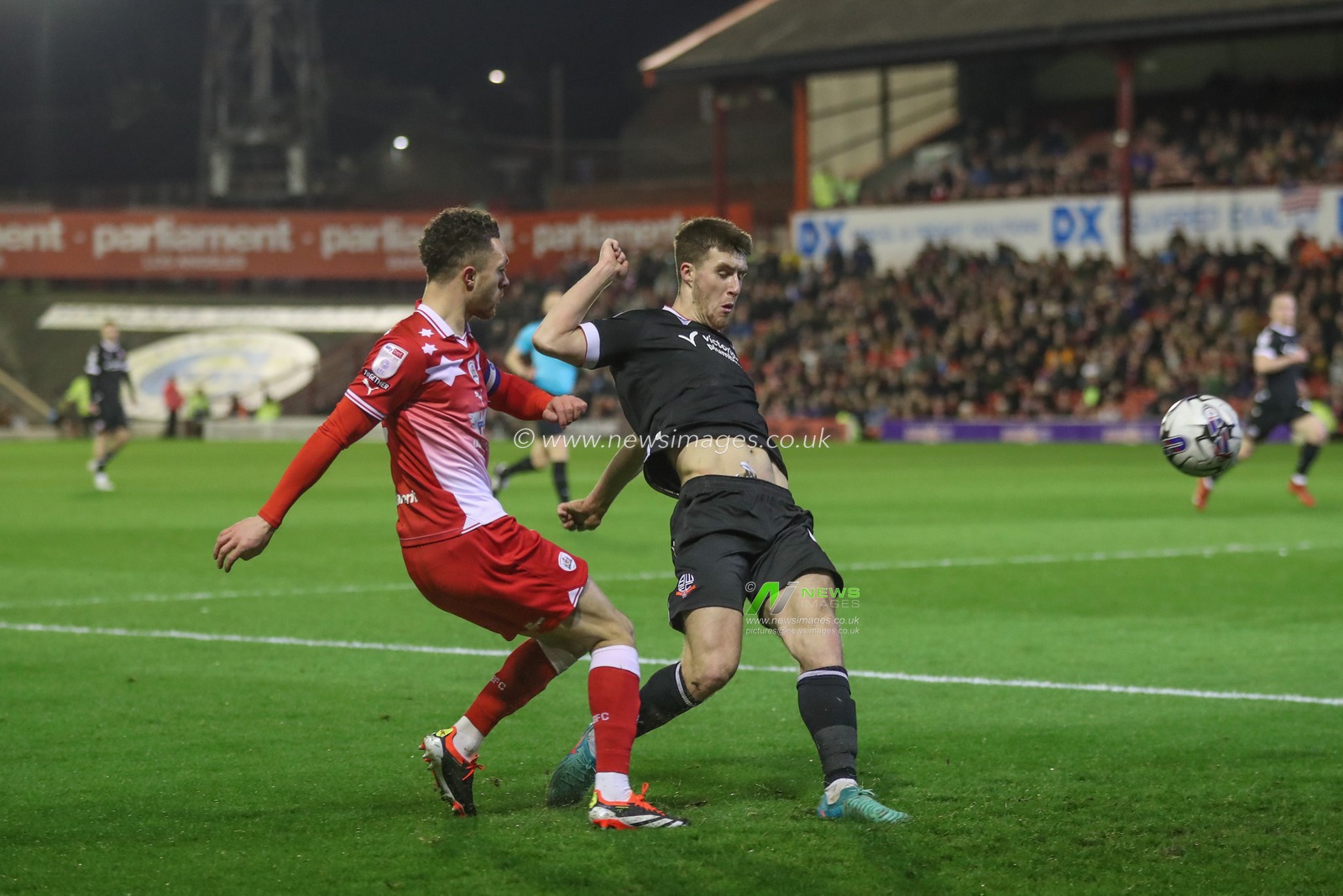Jordan Williams of Barnsley crosses the ball into the box during the Sky Bet League 1 match Barnsley vs Bolton Wanderers at Oakwell, Barnsley, United Kingdom, 5th March 2024

(Photo by Alfie Cosgrove/News Images)