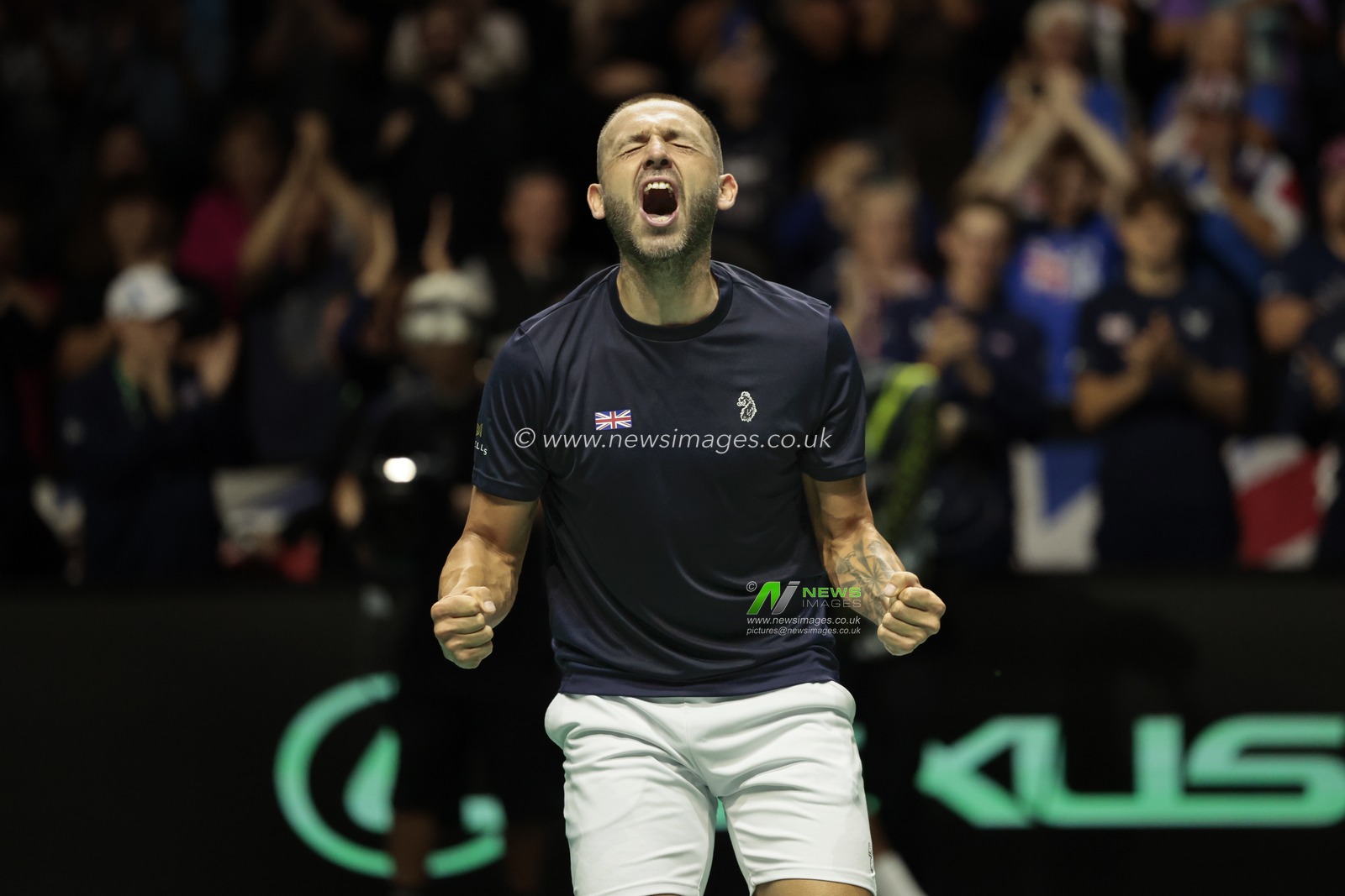 Daniel Evans (GBR) celebrates winning his game against Arthur Fils (FRA) during the Davis Cup match Great Britain vs France at Manchester AO Arena, Manchester, United Kingdom, 17th September 2023

(Photo by Conor Molloy/News Images)