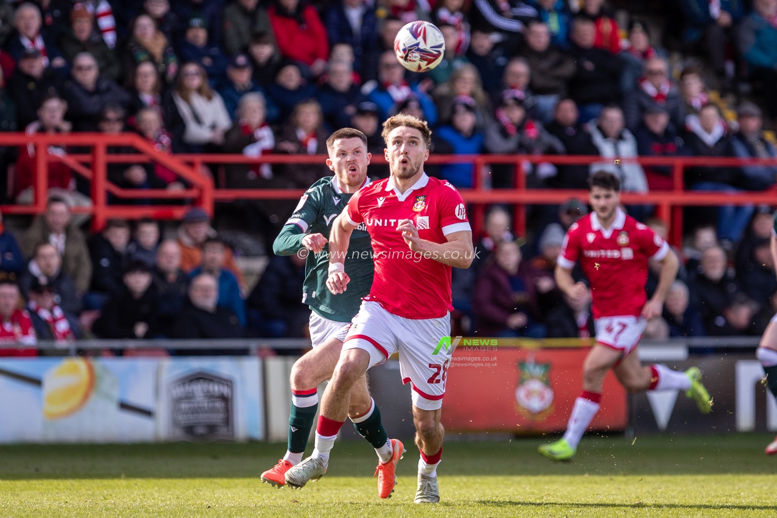 Sam Smith of/ Wrexham AFC during the Sky Bet League 1 match Wrexham vs Bolton Wanderers at SToK Cae Ras, Wrexham, United Kingdom, 1st March 2025

(Photo by Nik Mesney/News Images)