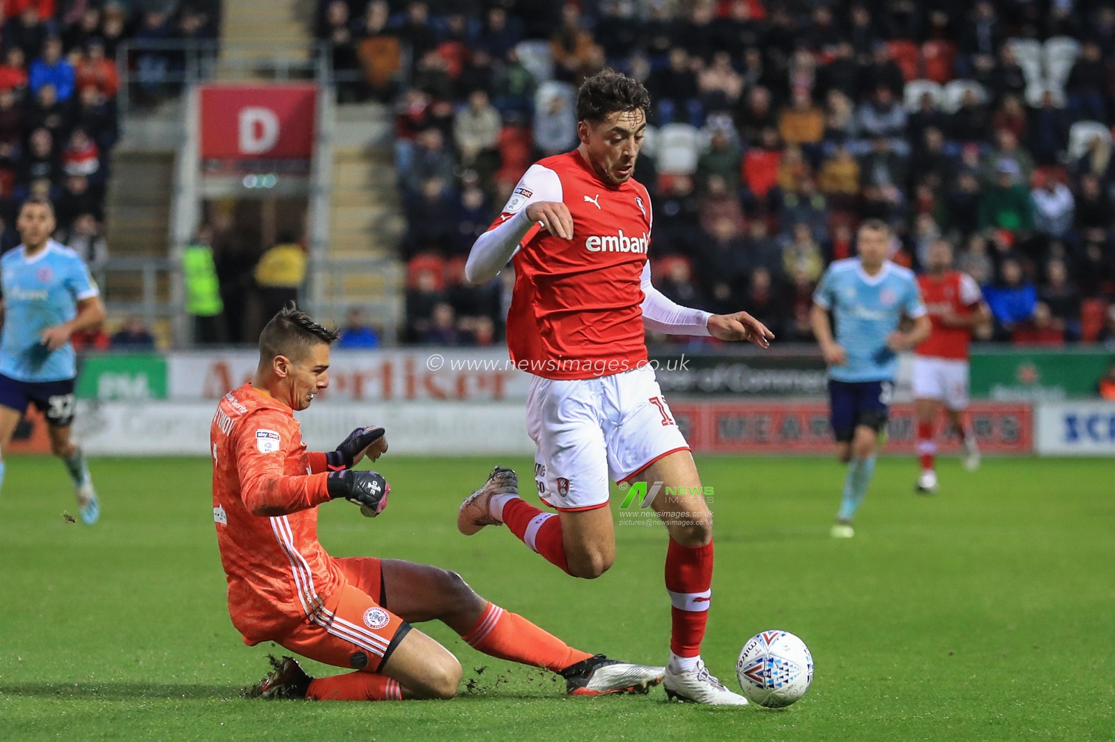 16th November 2019, New York Stadium, Rotherham, England; Sky Bet League 1, Rotherham United v Accrington Stanley : Dimitar Evtimov (1) of Accrington Stanley brings down Matt Crooks (17) of Rotherham United just outside the area 

Credit: Mark Cosgrove/News Images