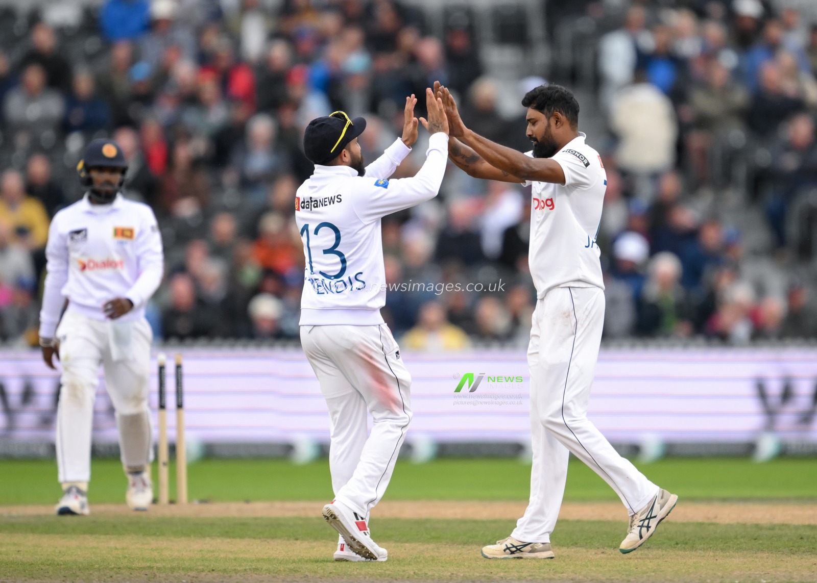 Prabath Jayasuriya of Sri Lanka celebrates bowling out Chris Woakes of England during the England Men v Sri Lanka 1st Rothesay Test Match Day 2 at Old Trafford, Manchester, United Kingdom, 22nd August 2024

(Photo by Craig Thomas/News Images)